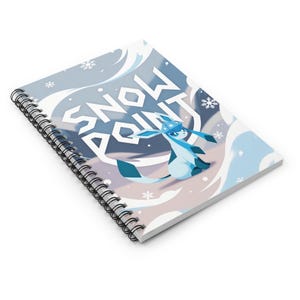 May include: Spiral-bound notebook with a cover featuring the text "SNOW POINT" in white and a blue cartoon character. The design includes snowflakes and a light blue and white color scheme.