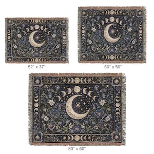 May include: Three rectangular woven throw blankets featuring a dark blue background with a central crescent moon, stars, and floral motifs. The borders display moon phases. Sizes are labeled as 52" x 37", 60" x 50", and 80" x 60" with fringed edges.