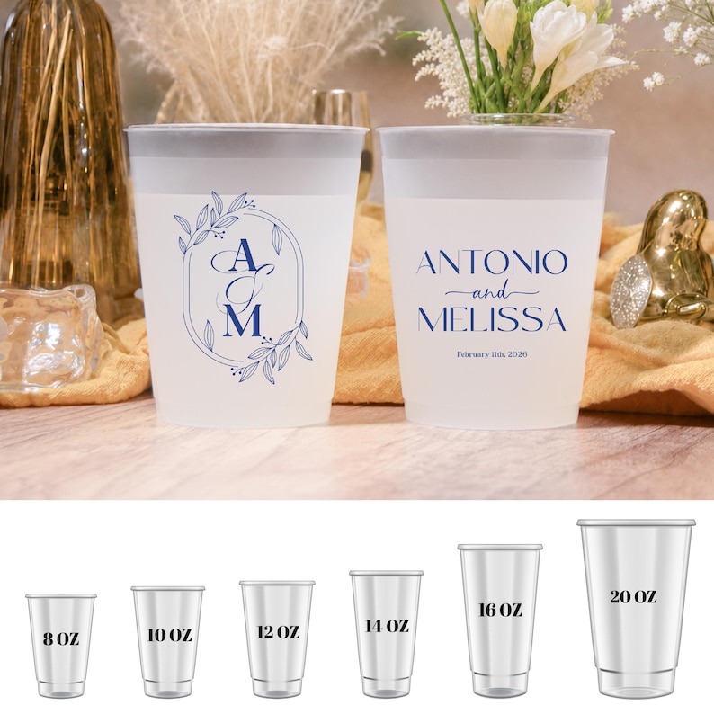 May include: Two frosted plastic cups with blue text and floral designs. One cup has the initials "A & M" inside a floral frame. The other cup reads "ANTONIO and MELISSA" with a date. Below are cups in 8, 10, 12, 14, 16, and 20 oz sizes.