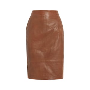 May include: A brown leather pencil skirt. The skirt is a solid color and has a classic, fitted silhouette. The skirt is made of a smooth, supple leather material.