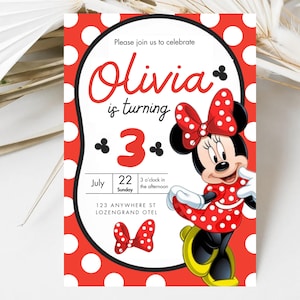 May include: A red and white polka dot invitation featuring Minnie Mouse. The invitation reads "Olivia is turning 3" with the date and time of the party. Minnie Mouse is wearing a red polka dot dress and bow.