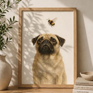 May include: A framed wall art print featuring a watercolour illustration of a tan pug dog looking upwards at a small bumblebee flying above its head. The artwork is set against a plain off-white background and enclosed in a light wood frame.