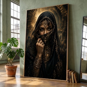 May include: A framed wall art print depicting a person wearing a black veil with intricate gold embroidery and matching gold jewelry. The person has dark eyes and is partially covered by the veil, set against a dark, circular, golden background.