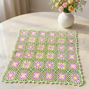 May include: A set of three ceramic nesting bowls in shades of blue, green, and white. The bowls feature a speckled design and varying sizes, perfect for food prep or serving.