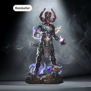 May include: A detailed figurine of a character with a purple and black suit, a red helmet, and energy effects. The figurine is on a rocky base with other small figures. The word "Bestseller" is in a white oval in the top left corner.