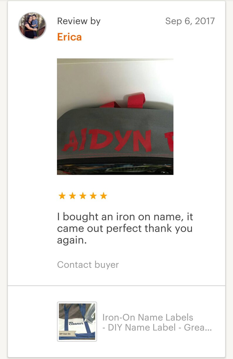 May include: A close-up of a gray backpack with a red iron-on name label that says "AIDYN".