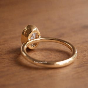 lab grown diamond ring
oval bezel engagement ring
2 carat lab diamond ring
bezel set diamond ring
cathedral engagement ring
IGI certified lab diamond
oval lab diamond solitaire
yellow gold bezel ring
minimalist engagement ring
modern bezel ring
low profile diamond ring
ethical diamond ring
lab diamond ring
gifts for women
gifts for her
gifts for sister
custom ring
cluster diamond ring
demi fine jewelry
elegant jewelry
timeless jewelry
minimalist ring
fine jewelry
proposal ring
signet ring