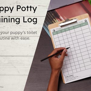 May include: A clipboard with a "Puppy Potty Training Log" printed on it. The log has a grid for tracking and the text "Track your puppy's toilet routine with ease." A hand is holding a pen over the log.