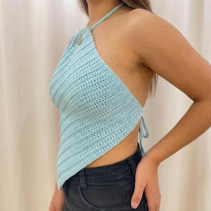 May include: A rustic wooden sign with the text "Welcome" in white lettering. The sign features a distressed finish and a simple, inviting design, perfect for a front porch or entryway.