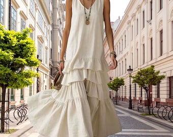 Vestido longo boho com camadas, sem mangas, decote em V, fluido, ideal para férias.