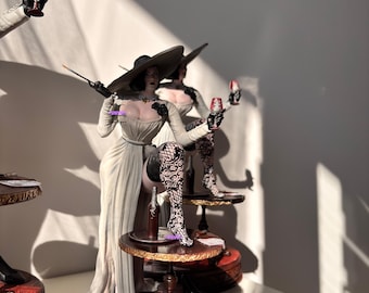 lady dimitrescu statue removable dress 1/12 Lady Dimitrescu figure. She comes with extra hands, a fly swatted, a  removable cloth top and nipples... for some reason.... I um... don't  remember that part of game but whatever. 7