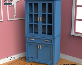 May include: A blue cabinet with glass-paned doors and a drawer, labelled "1/6 SCALE Digital file." The cabinet has wooden handles and is designed for small laser machines. The image includes a graphic of a laser cutter.