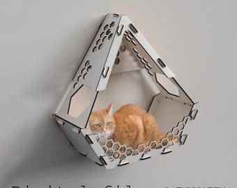 May include: A white geometric cat bed with a honeycomb pattern, mounted on a gray wall. An orange tabby cat is nestled inside. The text "Digital file" is at the bottom.