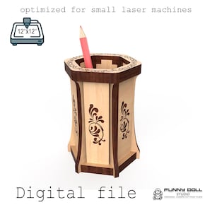 May include: A wooden pencil holder with a decorative floral design, a dark brown trim, and a pink pencil inside. The text "Digital file" is at the bottom. The image also includes the text "optimized for small laser machines" and a 12"x12" graphic.