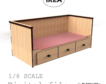 May include: A light wood-toned miniature bed frame with three drawers, a pink mattress, and dark brown trim. The text "INSPIRED BY IKEA" is in a black oval. The text "1/6 SCALE Digital file" is below the bed.