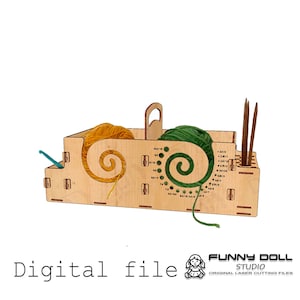 May include: A wooden yarn organizer with a handle, holding yellow and green yarn. It has slots for needles and a gauge chart. The text "Digital file" is at the bottom. The product is from Funny Doll Studio.