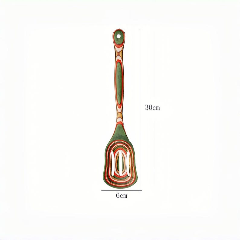 May include: A wooden slotted spatula, 11.8 inches long and 2.4 inches wide, with a green, red, and white striped design. The spatula has a hole in the handle for hanging and is designed for kitchen use.