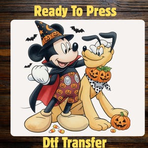 May include: A DTF transfer featuring Mickey Mouse dressed as a vampire with a pumpkin-patterned outfit and Pluto wearing a pumpkin collar. The design includes bats, candy corn, and the text Ready To Press and Dtf Transfer in yellow font.