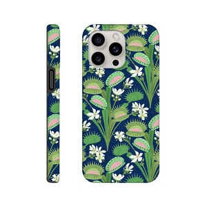 May include: A smartphone case featuring a repeating pattern of green Venus flytraps with pink interiors and small white flowers against a dark blue background with a subtle wavy line texture. The case includes cutouts for the camera and side buttons.