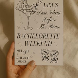 May include: A black and white bachelorette party invitation. The invitation features a drawing of a woman in a martini glass, the text "Jade's Last Fling Before The Ring", and details for the weekend in September in Liverpool.