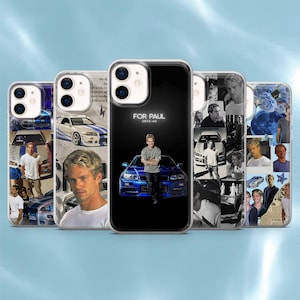 Puede incluir: Varias fundas para teléfono con imágenes de una persona, coches y el texto "FOR PAUL (1973-2013)". Las fundas tienen un acabado brillante y están diseñadas para varios modelos de teléfono.