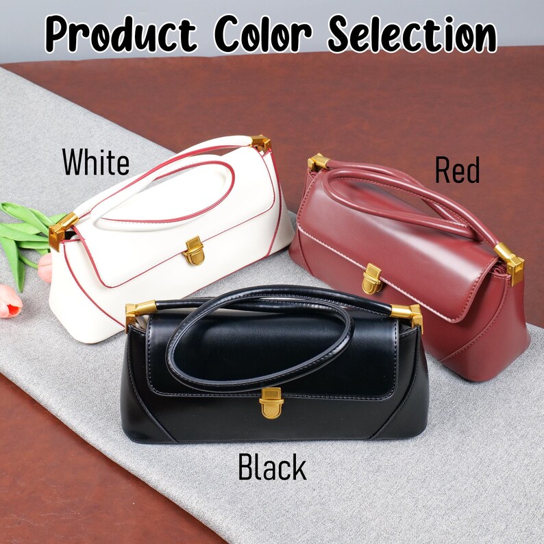 May include: Three rectangular handbags in white, red, and black, each with a gold-coloured clasp and handle accents. The image includes the text "Product Colour Selection" and labels each bag's colour.