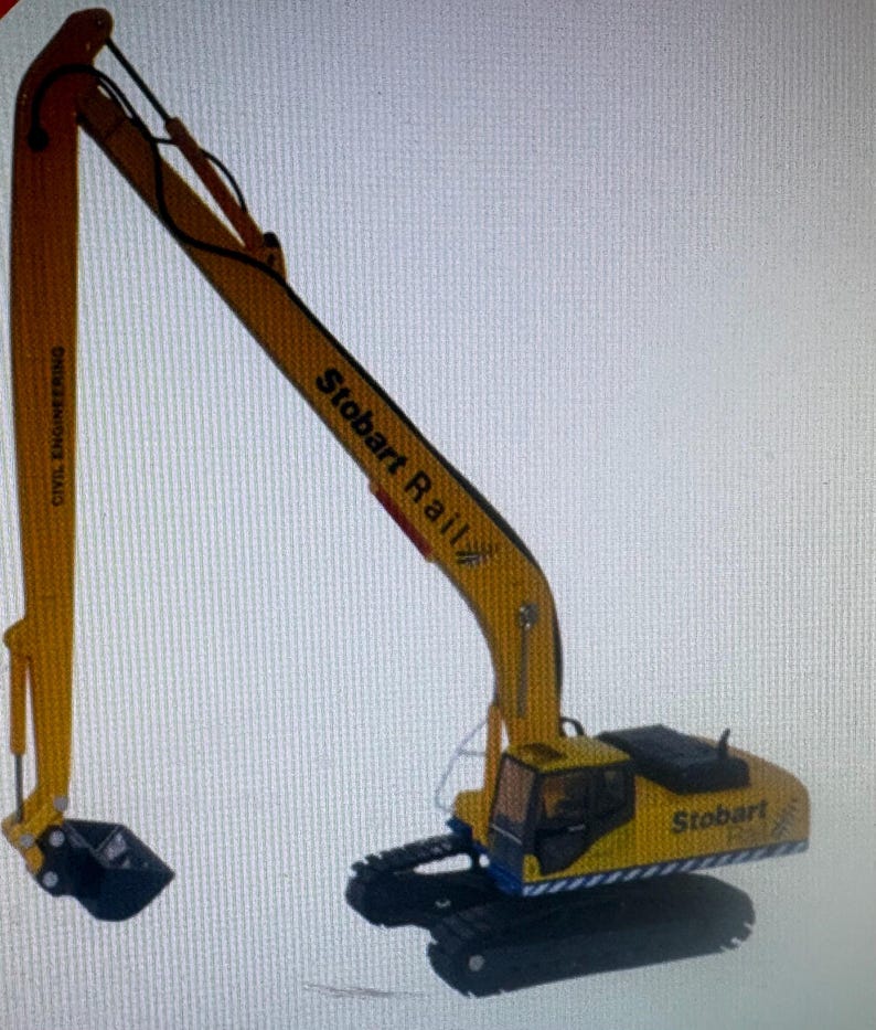 May include: A yellow and black toy excavator with the text "Stobart Rail" and "Civil Engineering" printed on the arm. The excavator has a black bucket and a black base.