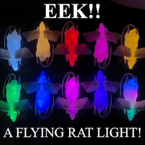 Usch, ett flygande råttljus! ... en strålande, bevingad lampa