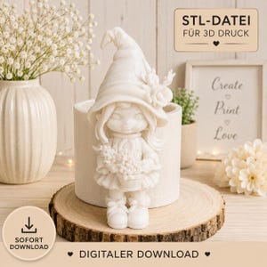May include: A white 3D printed figurine of a character wearing a tall, pointed hat adorned with flowers, holding a small basket of blossoms. The figurine is positioned in front of a white cylindrical container, with text reading STL-DATEI FÜR 3D DRUCK.