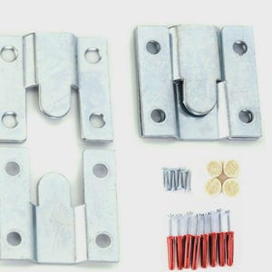 May include: A set of four silver picture frame hangers with multiple screw holes. The set includes screws, wall plugs, and felt pads. The hangers are designed to interlock for secure mounting of picture frames.