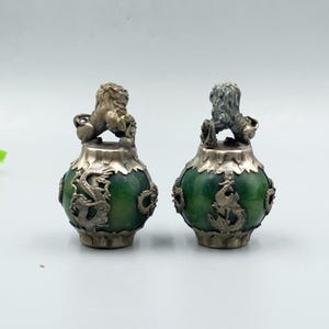 A pair of antique Tibetan silver jade dragon phoenix  lion ball ornament - unique design