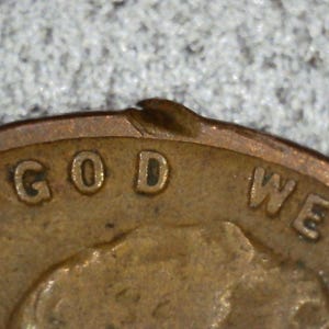 Moneda de un centavo de trigo de 1941 con error de recorte en el cospel – Moneda con recorte irregular – L en el borde Lincoln Cent