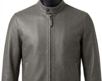 May include: A smooth, matte grey leather jacket featuring a stand-up collar with a single snap button closure, a full-length central zipper with a matching pull tab, and two vertical slit pockets on the lower front section.