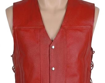 May include: A bright red sleeveless vest featuring a textured finish, a V-neckline, and a front closure with three silver-toned metal snap buttons. The sides of the garment are detailed with integrated lacing cords that run vertically along the seams.
