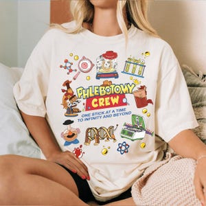 May include: A set of three ceramic mugs with a speckled, matte finish. The mugs are in shades of cream, light gray, and dark gray. Each mug has a simple, minimalist design, perfect for coffee or tea.