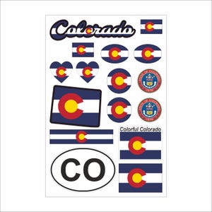 May include: A sticker sheet with various designs of the Colorado state flag and emblem. Includes the word "Colorado", flags in different shapes, the state seal, and the letters "CO" in an oval. The stickers are in blue, white, red, and yellow.