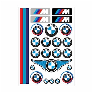 May include: A sheet of BMW-themed stickers featuring the BMW logo, the M logo, and racing stripes in red, blue, and white. The stickers are in various shapes and sizes, suitable for automotive or decorative use.