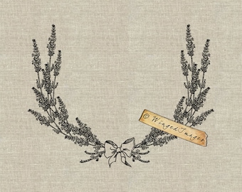 May include: Black and white illustration of a wreath made of lavender sprigs with a bow in the center. The wreath is on a beige linen background. The text "© Winged Images" is on a brown tag.