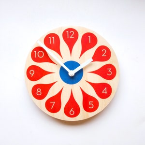Bloom Wooden Wall Clock With Neutra Numbers. Unique colourful mid century modern silent analog clock for the kitchen, living room or bedroom