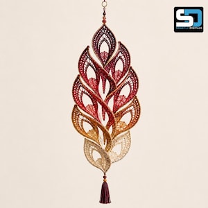 May include: A hanging decorative ornament featuring a vertical arrangement of interconnected, leaf-shaped lace elements. The piece displays a gradient color transition from deep burgundy at the top to golden yellow and cream at the bottom, ending in a tassel.