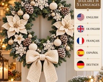 May include: A circular Christmas wreath featuring dark green foliage adorned with cream-colored crocheted poinsettias, snowflakes, and spheres. Brown pinecones and a large cream crocheted bow are attached. A side panel displays the text AVAILABLE IN 5 LANGUAGES.