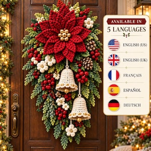 May include: A crochet Christmas door swag featuring a large red poinsettia, two cream-colored bells, green pine needles, red berries, and small white flowers. A rectangular sign to the right displays the text AVAILABLE IN 5 LANGUAGES.