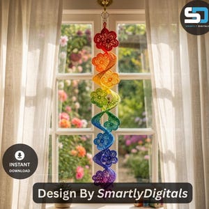 May include: A hanging spiral decoration featuring a series of crocheted flowers in a vibrant rainbow gradient, transitioning from red at the top through orange, yellow, green, and blue, to purple at the bottom, suspended by a metal ring.