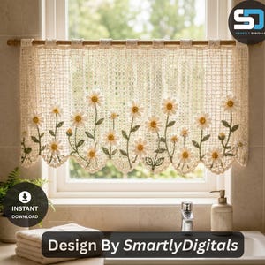 May include: A cream-colored crochet cafe curtain featuring a delicate grid pattern and a row of embroidered white daisy flowers with yellow centers and green stems along the scalloped bottom edge, suspended from a wooden rod.