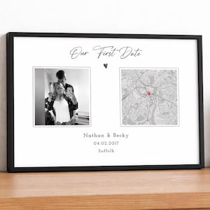 May include: Framed print with two black and white images. One shows a couple taking a selfie, the other a map with a red marker. Text reads "Our First Date", names, date, and location in Suffolk.