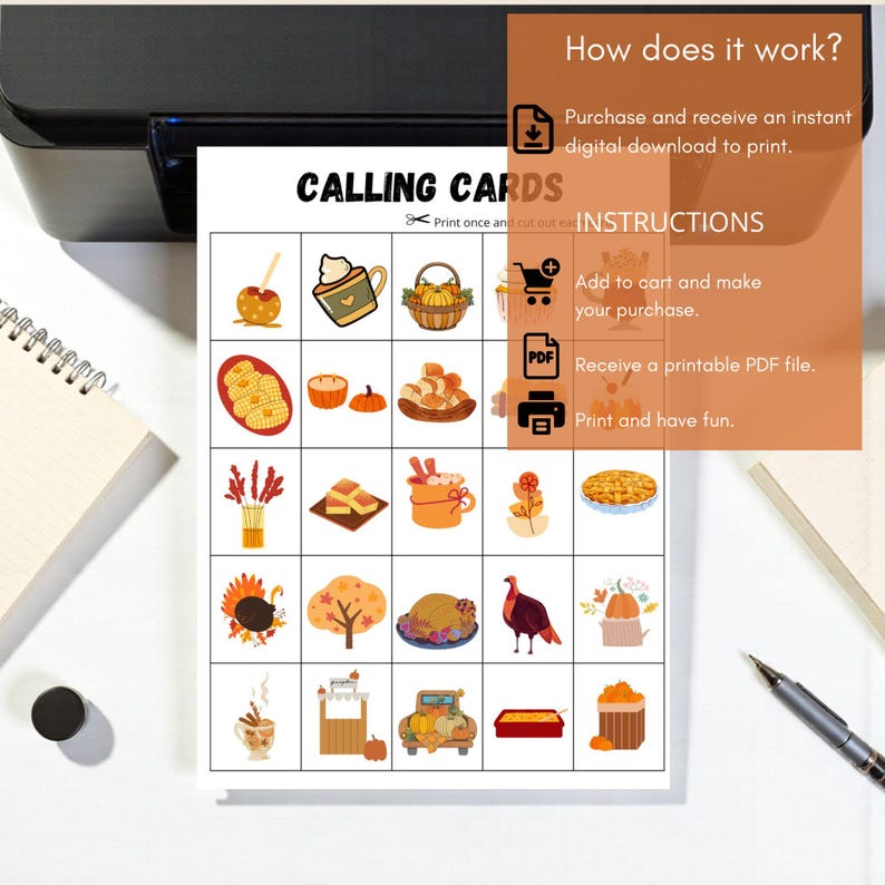 May include: A printed sheet with the words "CALLING CARDS" and instructions for use. The sheet features a grid of colorful illustrations of fall-themed items like pumpkins, pies, and turkeys. A printer and pen are visible in the background.