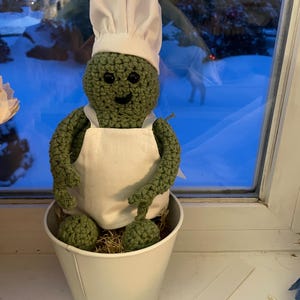 A figura de crochê do Pequeno Chef