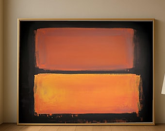 May include: Abstract painting with two horizontal orange rectangles on a black background, framed in gold. The top rectangle is a darker shade of orange than the bottom one. The artwork is displayed on a wooden floor.