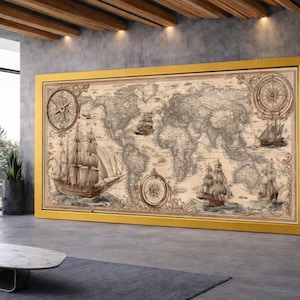 Peut inclure: Grande carte du monde encadrée avec un cadre doré. La carte présente des illustrations nautiques vintage de navires et de compas. La carte est dans des tons de marron et de beige, avec une cartographie détaillée.