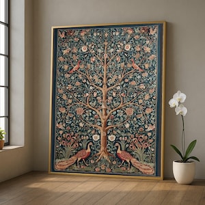 May include: A framed tapestry featuring a tree design with birds and peacocks. The artwork has a gold frame and a dark teal background with floral and foliage details. The tapestry is displayed in a room with a window and a potted orchid.